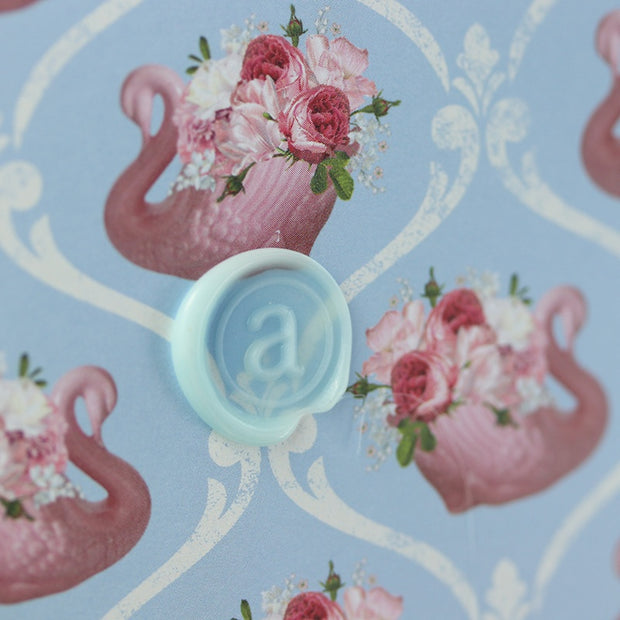anoint_pink_clay_envelope_macro.jpg